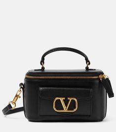 VLogo Locò Mini leather makeup bag in black - Valentino Garavani | Mytheresa Luxury Pouch Box Bag With Zipper Closure, Luxury Crossbody Box Bag With Zipper, High-end Evening Bags With Zipper Closure, High-end Evening Bags With Zipper, Evening Pouch Box Bag With Zipper, Evening Pouch Box Bag With Zipper Closure, Evening Box Bag With Zipper Closure, Black Designer Bags, Valentino Purse