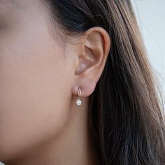 Featuring a minimalistic drop style design, the Elan Diamond Hanging Round Earrings will elevate your everyday look with the hanging round diamond adding some sparkle to your collection. Available in 10K and 14K yellow gold, white gold, and rose gold Length: 15.71 mm / Width: 4.81 mm SI1 Diamond Clarity H-I Diamond Color Total Carat weight: 1/10 CT Ethically sourced materials and conflict-free diamonds Fully compliant with The Kimberley Process White Gold Minimalist Earrings, Small Drop Earrings Gold Indian, Diamond Earrings Daily Wear, Hanging Diamond Earrings, Small Hanging Earrings Gold, Small Hanging Earrings, Everyday Diamond Earrings, Small Diamond Earrings, Diamond Earrings Indian