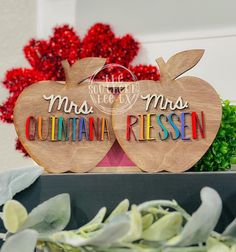 a wooden sign that says, miss and mrs quintaa riesen