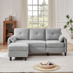 a living room scene with focus on the sectional sofa