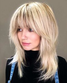 The modern shag is one of the hottest hair trends of 2023. Here are 21 of the cutest modern shag haircuts in the world today. Whether you have short, medium, long, wavy, or curly hair, you'll be able to find some serious hair inspo in this post! #shaghaircut #modernshag #haircuts #hairstyles #hairinspo Mid Length Blonde, Modern Shag Haircut, Rachel Williams, Medium Blonde Hair, Shaggy Haircuts, Layered Hairstyles, Haircut Styles, Shag Hairstyles, Shag Haircut