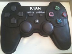 a birthday cake made to look like a video game controller