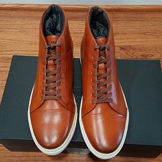 ** New Item With Box. Please Inquire For Detailed Pics If Interested ** Casual Meets Elevated On This Contemporary High-Top Sneaker That's Cleanly Styled With A Cap Toe And Padded Collar. ** Hand Made In Portugal ** Luxury Brown Leather High-top Sneakers, Formal Low-top Leather Boots, Luxury Leather High-top Sneakers With Round Toe, Hightop Sneakers, Allen Edmonds, New Item, Mens Shoes Sneakers, High Top, High Tops