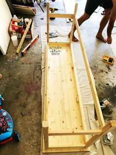 a wooden bench being built in a garage