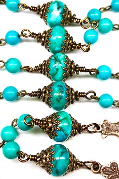 "TRUE BRONZE & GENUINE SINKIANG TURQUOISE ROSARY: 21 Inches Long Your beautiful rosary is made to last a lifetime and become an heirloom for your family. It will come nicely packaged in an organza pouch with a \"How To Pray The Rosary\" pamphlet included. Please remember to have your priest bless your rosary. Materials Used: Genuine Sinkiang Turquoise 6mm Beads, 12mm Turquoise Jasper Rondelle Beads as Paters, True Bronze 2 Inch Crucifix, True Bronze 1.75 Inch Mother Mary/Immaculate Heart Cen Spiritual Turquoise Necklace With Spacer Beads, Spiritual Turquoise Beaded Bracelets For Jewelry Making, Turquoise Rosary With Round Beads, Spiritual Turquoise Rosary With Round Beads, Turquoise Rosary With Round Beads As Gift, Turquoise Spacer Beads For Healing, Turquoise Healing Spacer Beads, Healing Turquoise Spacer Beads, Turquoise 8mm Beads For Jewelry Making