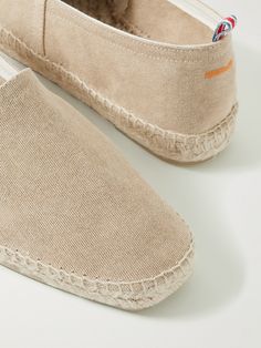 Castañer has nearly a century of shoemaking under its belt and designs the same authentic espadrilles as when it first started out in 1927. This 'Pablo' pair has been made in Spain from breathable, hard-wearing canvas and features braided jute soles reinforced with a layer of rubber underneath. Classic Summer Slip-on Espadrilles, Classic Beige Espadrilles With Woven Sole, Classic Slip-on Espadrilles For Spring, Classic Round Toe Espadrilles For Summer, Classic Beige Slip-on Espadrilles, Classic Espadrilles With Woven Sole And Round Toe, Classic Espadrilles With Contrast Sole For Spring, Classic Slip-on Summer Espadrilles, Closed Toe Canvas Espadrilles With Woven Sole