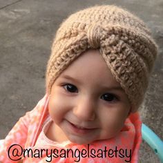 Crochet baby turban. Made to order. Choose color and size from menus. They are very warm, comfortable, and perfect for any outfit. Made in a smoke-free and pet-free home. 100% acrylic yarn.  Care: Machine wash warm, gentle cycle. Tumble dry low. Do not over dry. For best results on fringe, hand wash and lay flat to dry. Follow us for coupons, giveaways, and more!: Instagram: @marysangelsatetsy Facebook: www.facebook.com/marysangels Twitter: @marysangelsetsy Pinterest: @crochetbymary Baby Hat Crochet, Crochet Baby Cap, Crochet Mens Hat, Baby Turban Hat, Handmade Baby Items, Fast Crochet, Christmas Toddler, Crochet Baby Hat, Crochet Hat For Women