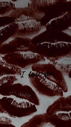 a group of red lips with the words i love you written on them