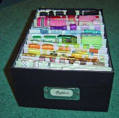 a black box filled with lots of different colored items