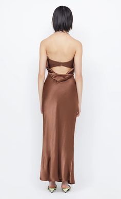 A best selling silhouette, the Moon Dance Strapless is an easy to wear bias cut maxi dress that flatters all body shapes. The maxi dress features a statement low cowl back fastened with a back clip. FIT: designed to be fitted on the bust with an elasticated neckline, dress then skims over the hips and flows into a relaxed fit skirt. The fabric does not provide stretch to the fit. Dress is not bra friendly. SIZING: True to size, select your normal size. Australia Style, Moon Dance, Fit Skirt, Hemant And Nandita, Rebecca Vallance, Sleepwear Dress, Cotton Citizen, Bec Bridge, Tanya Taylor