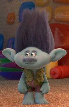 an animated troll with purple hair standing in front of toys