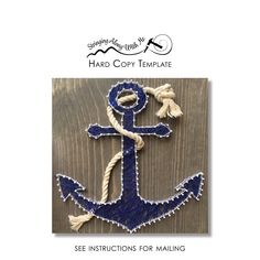 an anchor made out of rope on top of a wooden board with the words hard copy template