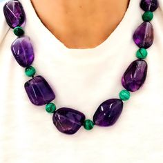 A modern circa 1980 beaded necklace by the Italian designer Tambetti featuring large nugget shape of natural amethysts alternated with round malachite beads. The clasp is designed to compliment the irregular shape of the amethysts, it is made in 18 karat polished yellow gold. The necklace weighs 188 grams and 21 inches long. Short Necklaces, Miriam Haskell Jewelry, Italian Designer, Old Jewelry, Short Necklace, High Jewelry, Collar Necklace, Italian Design, Amazing Jewelry