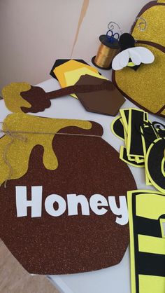 honey themed party supplies on a table