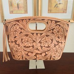 Tooled Leather Tote Bag. Brand New With Tag Pristine Condition Measurements: Widest Upper Part Of Bag Is 18 Inches. Vertically 11.5 Inches. Includes A Removable Shoulder Strap Elegant Leather Clutch With Hand Tooled Details, Elegant Hand-tooled Clutch Bag, Elegant Hand Tooled Clutch Bag, Elegant Top Handle Hand Tooled Bag, Tool Tote Bag, Clear Tote Bags, Dog Tote Bag, Reversible Tote Bag, Vintage Tote Bag