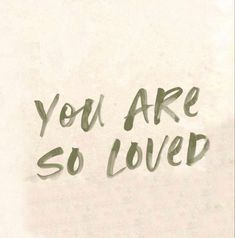 the words you are so loved written in black ink on a white paper with green writing