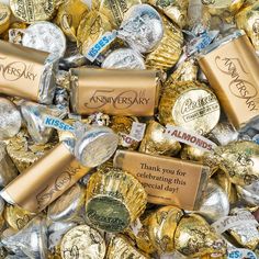 a pile of gold foil wrapped chocolates with the words free cold packaging on them