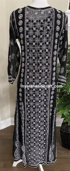 Gorgeously hand embroidered georgette Anarkali with side slits. Resham thread heavy embroidery back and front! Beautiful craftsmanship, neatly embroidered. Anarkali Length : 51-52inches Embroidered Long Anarkali Kurta, Long Embroidered Anarkali Kurta, Anarkali Embroidered Long Kurta, Black Salwar Kameez With Resham Embroidery, Long Embroidered Salwar Kameez, Long Embroidered Salwar Kameez For Navratri, Black Chanderi Fabric With Chikankari Embroidery, Long Georgette Kurta With Intricate Embroidery, Traditional Black Fabric With Chikankari Embroidery