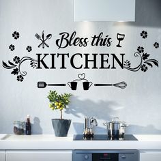 PRICES MAY VARY. Kitchen wall decor: bless this kitchen wall sign for your kitchen room and dining room add a warm atmosphere to the kitchen room or dining room. When you see this kitchen quote always make you good mood. Package contents: you will be provided with 1 set of wall kitchen sign, and flower, spoon and fork, the black simple style is match with any style walls. Wall kitchen decor will be giving your kitchen a beautiful appearance, and you can share it with your family and friends. Dur Wall Stickers For Kitchen, Kitchen Wall Art Stickers, Baking Room, Kitchen Decor Signs, Kitchen Wall Decals, Girly Apartment Decor, Kitchen Stickers, Kitchen Quotes, Kitchen Wall Stickers