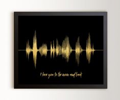 a black and gold sound wave with the words i love you to the moon and back