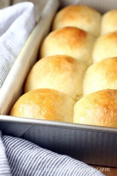 bread rolls in a baking pan with text overlay that reads, how to make homemade buttery brioche