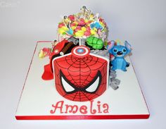 a spiderman birthday cake with the name amelie on it's front and sides