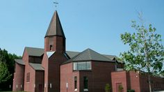 an old church with a steeple on the top