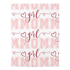 a pink and white towel with the words,'mom girl'in red letters