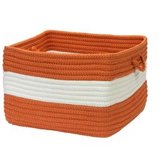 an orange and white striped basket with handles