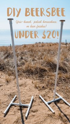 two white signs sitting on top of a sandy beach next to the ocean with words diy beersbef under $ 20