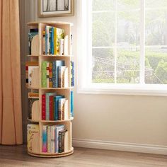 a bookshelf in front of a window filled with books