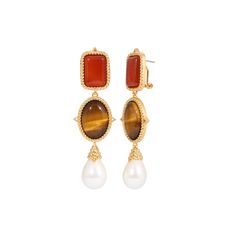 The Bianca Earrings add a touch of romance to your look with Carnelian, Tigers Eye and Pearl. Brass with 14k yellow gold overlay Genuine Carnelian Agate, Tigers Eye, Mabe Pearl Post with omega backing Approximately 2.5" in length Elegant Orange Clip-on Earrings, Elegant Carnelian Drop Earrings, Elegant Carnelian Earrings, Elegant Carnelian Dangle Earrings, Gold Carnelian Gemstone Earrings, Elegant Carnelian Jewelry For Formal Occasions, Elegant Orange Earrings With Natural Stones, Elegant Gold Carnelian Earrings, Elegant Orange Carnelian Earrings