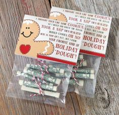 two bags filled with candy sitting on top of a wooden table