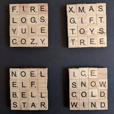 four scrabble tiles with words on them that say fire, logs, toys, and trees