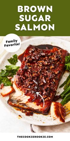 brown sugar salmon on a plate with asparagus and broccoli