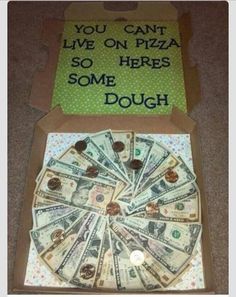 an open box with money in it that says you can't live on pizza so here some dough