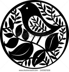 a black and white silhouette of a bird on a branch with leaves in a circle