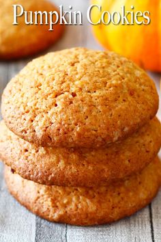 three cookies stacked on top of each other with the words pumpkin spice pumpkin cookies above them