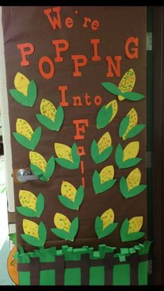 a bulletin board with corn on the cob and we're popping into it