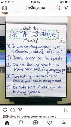 a white sign with writing on it that says what does active listening mean?