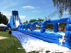 an inflatable water slide on the lawn