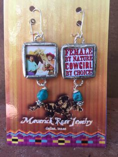 "These are fun earrings for the cowgirl at heart. There are double images on these earrings. One side says FEMALE BY NATURE COWGIRL BY CHOICE the other side is a vintage image of two cowgirls with their horse. Two different looks with these earrings. There is a genuine Turquoise drop bead dangling from the soldered frames. Soldered in glass. Silverplated. * Maverick Rose handmade earrings from Dallas, Texas * Genuine Turquoise * Soldered frame is 3/4\" by 3/4\" * Drop length is 1 3/4\" * FREE SH Picture Earrings, Cowgirl Vintage, Cowgirl Pictures, Western Turquoise, Earrings Western, Horse Earrings, Cowgirl Jewelry, Western Earrings, Cowgirl Hat