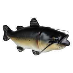 a plastic fish that is black and brown with yellow stripes on it's body