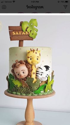 there is a cake with animals on it