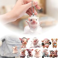 small pig figurines are being held by someone