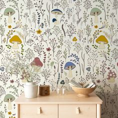 the wallpaper has mushrooms and flowers on it