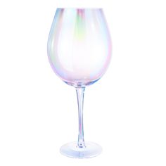 a clear wine glass sitting on top of a white table