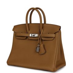 This Birkin is a verso in Bronze D'or Togo and Blue Brume Chevre with Palladium Hardware and has tonal stitching, front flap with two straps, front toggle closure, clochette with lock and two keys, double rolled handles. The interior is lined with Bleu Brume chevre and is one zip pocket with an Hermes engraved pull and an open pocket on opposite side.Collection: ZOrigin: FranceCondition: New and never worn (plastic on hardware) Accompanied by: Hermes box, Hermes dustbag, clochette, lock, two key Hermes Birkin 25, Hermes Box, Birkin 25, Hermes Birkin, New Bag, Luxury Bags, Fashion Bags, Zip Pockets, Bags Designer