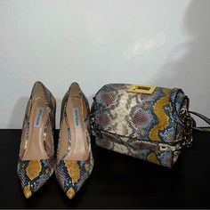 Snake Print Multi-Color Heels And Matching Purse. Only Used Once! Inside Heel Is In Pristine Condition. Purse Has Never Been Used And Has A Strap Still In Packaging. Snake Print Pointed Toe Heels For Party, Multi Colored Heels, Medium Width Leather Snake Print Heels, Brown Leather Snake Print Heels, Steve Madden Heels, Chic 4-inch Heel Leopard Print Heels, Leopard Print Heels With Pointed Toe And 4-inch Heel, Steve Madden Shoes, Snake Print