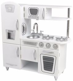 a white play kitchen with sink, stove and oven in the middle is shown on a white background